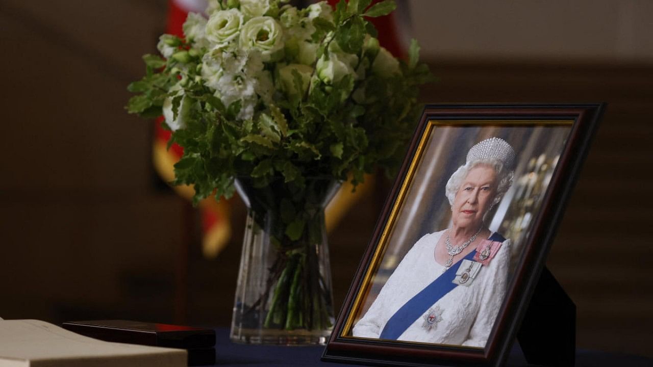 A portrait of Britain's Queen Elizabeth is displayed at the British Embassy in Paris. Credit: Reuters Photo