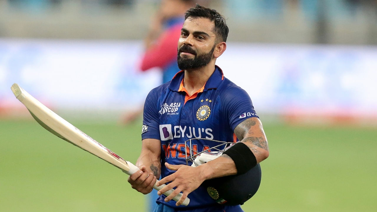 Virat Kohli coming back to the pavilion after scoring a century during India's Asia Cup T20 match against Afghanistan, September 8, 2022. Credit: IANS Photo
