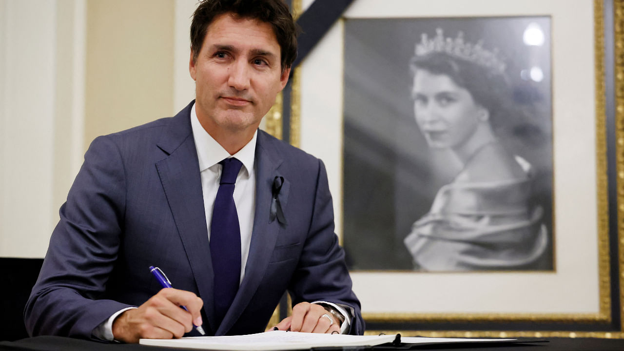 Justin Trudeau signs a book of condolences for Britain's Queen Elizabeth at Rideau Hall in Ottawa, Ontario, Canada September 9, 2022. Credit: Reuters Photo