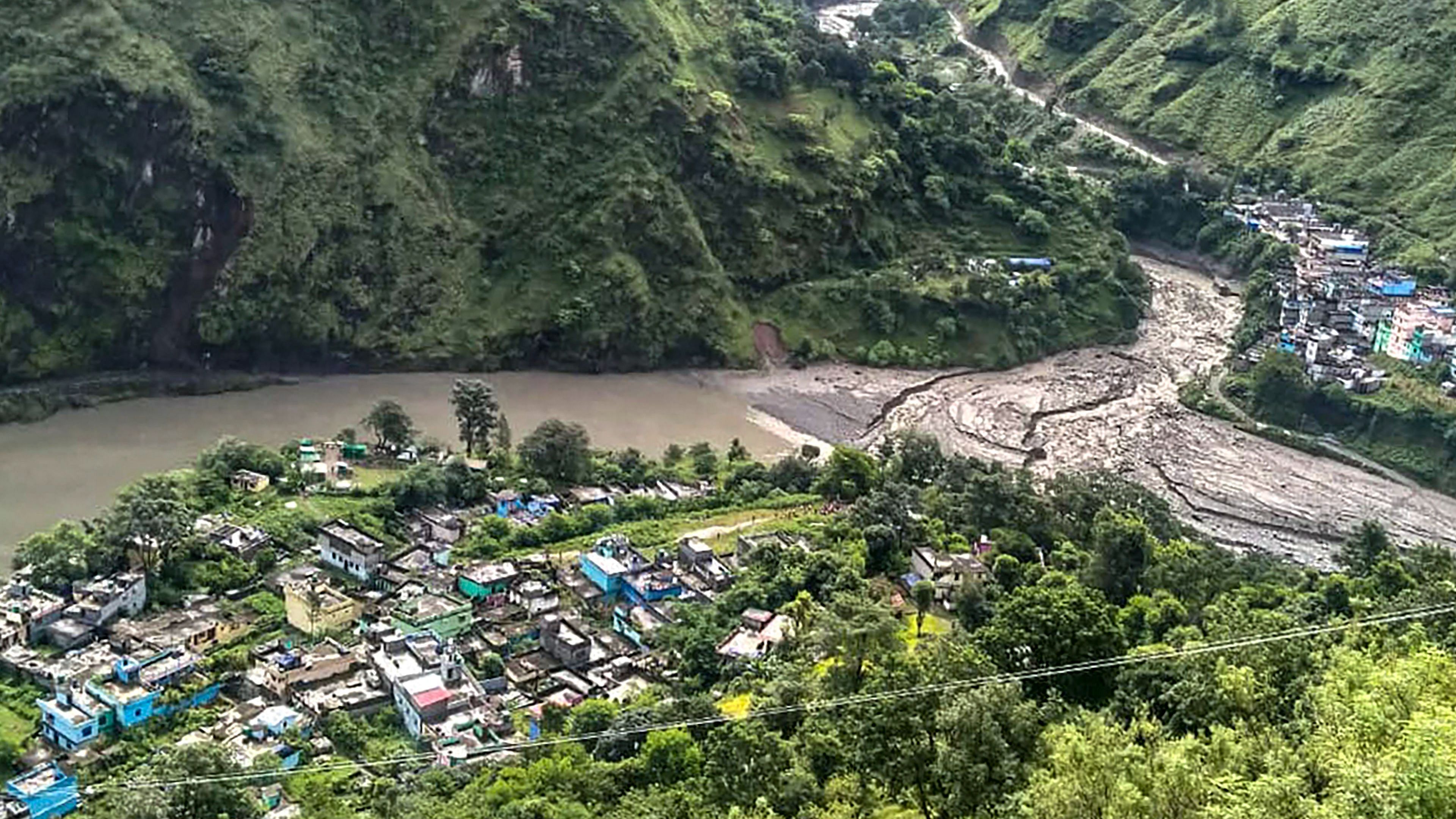 Swollen Mahakali river after a cloudburst at Dharchula near the India-Nepal border, in Pithoragarh district. Credit: PTI Photo