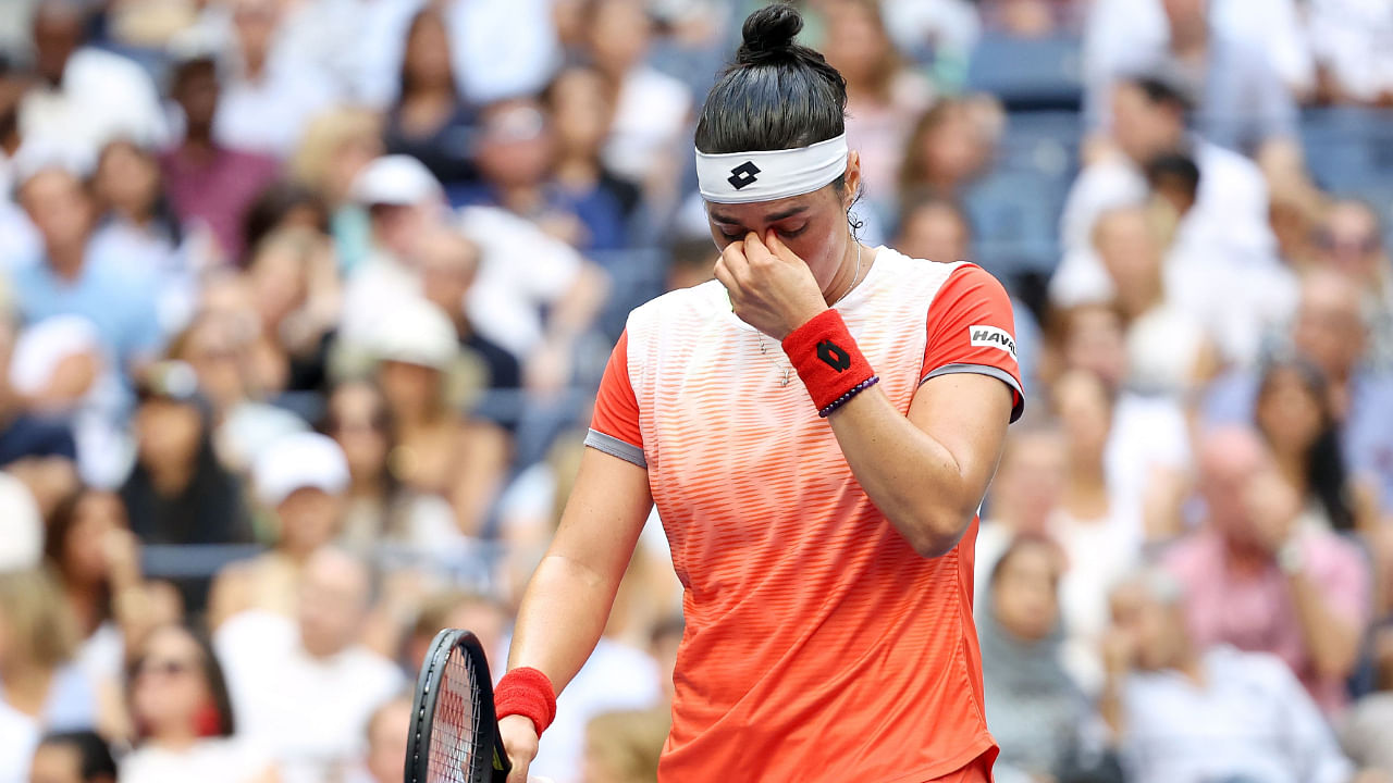 Ons Jabeur reacts during her match against Iga Swiatek in the US Open, September 10, 2022. Credit: AFP Photo
