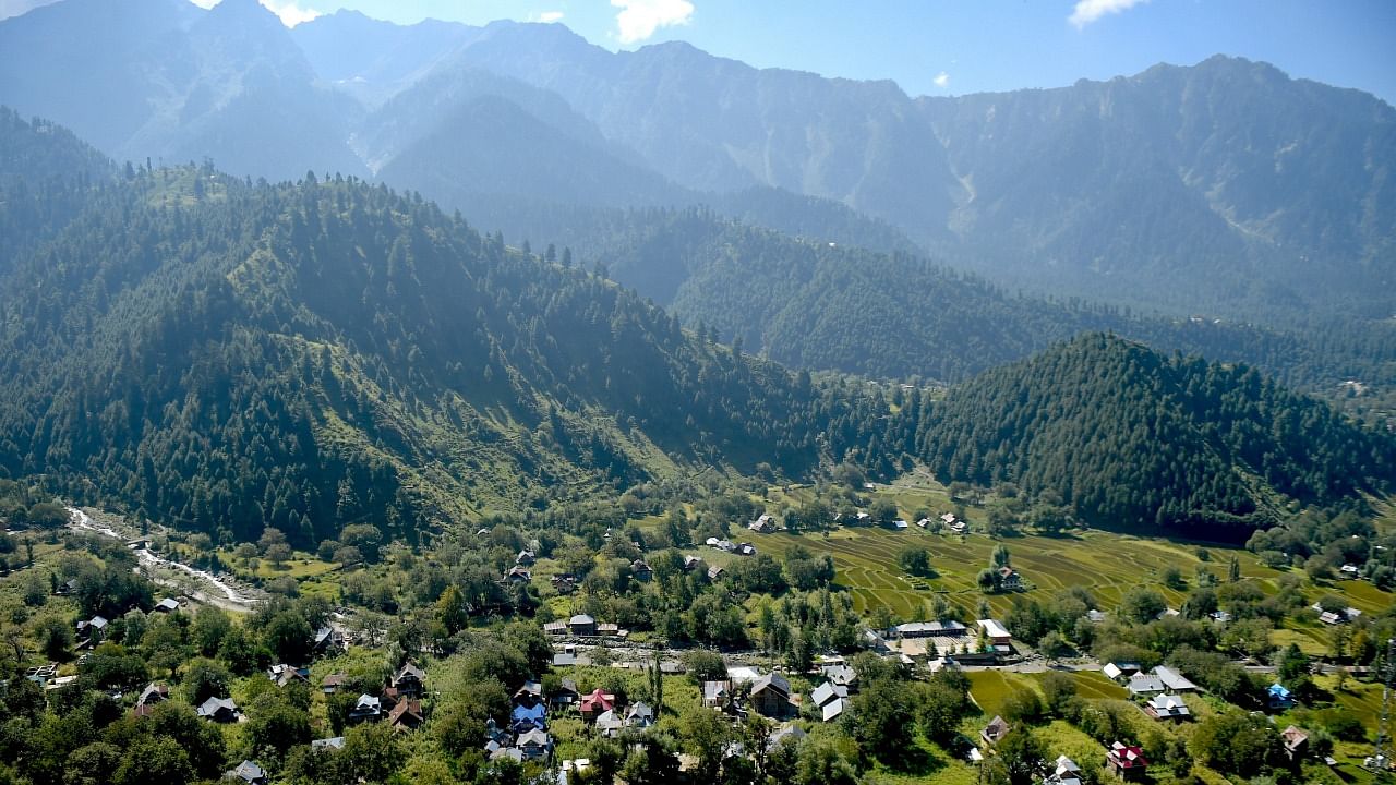 A scene of houses and paddy field of a village at Karnah Sector in border district of Kupwara. Credit: PTI Photo