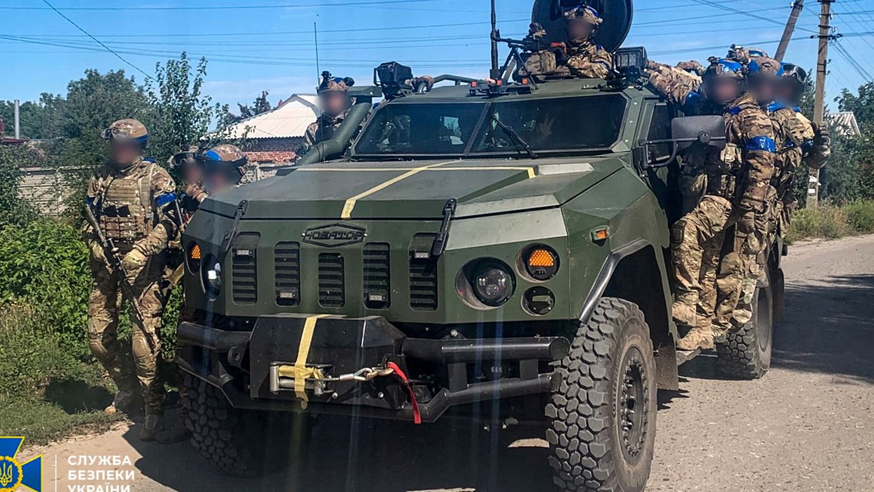 Service members of the State Security Service of Ukraine patrol of an area of the recently liberated town of Kupiansk, amid Russia's attack on Ukraine, in Kharkiv region. Credit: Reuters Photo