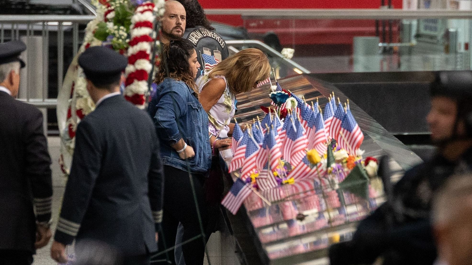 Relatives of the victims look at the 9/11 Memorial in New York City on September 11, 2022, on the 21st anniversary of the attacks on the World Trade Center, Pentagon. Credit: AFP Photo