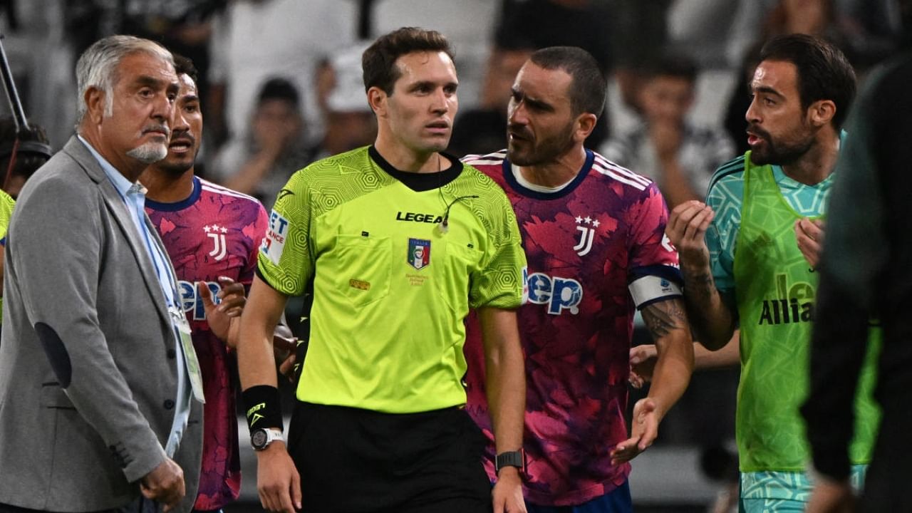 Juventus' Leonardo Bonucci remonstrates with referee Matteo Marcenaro after the match. Credit: Reuters Photo