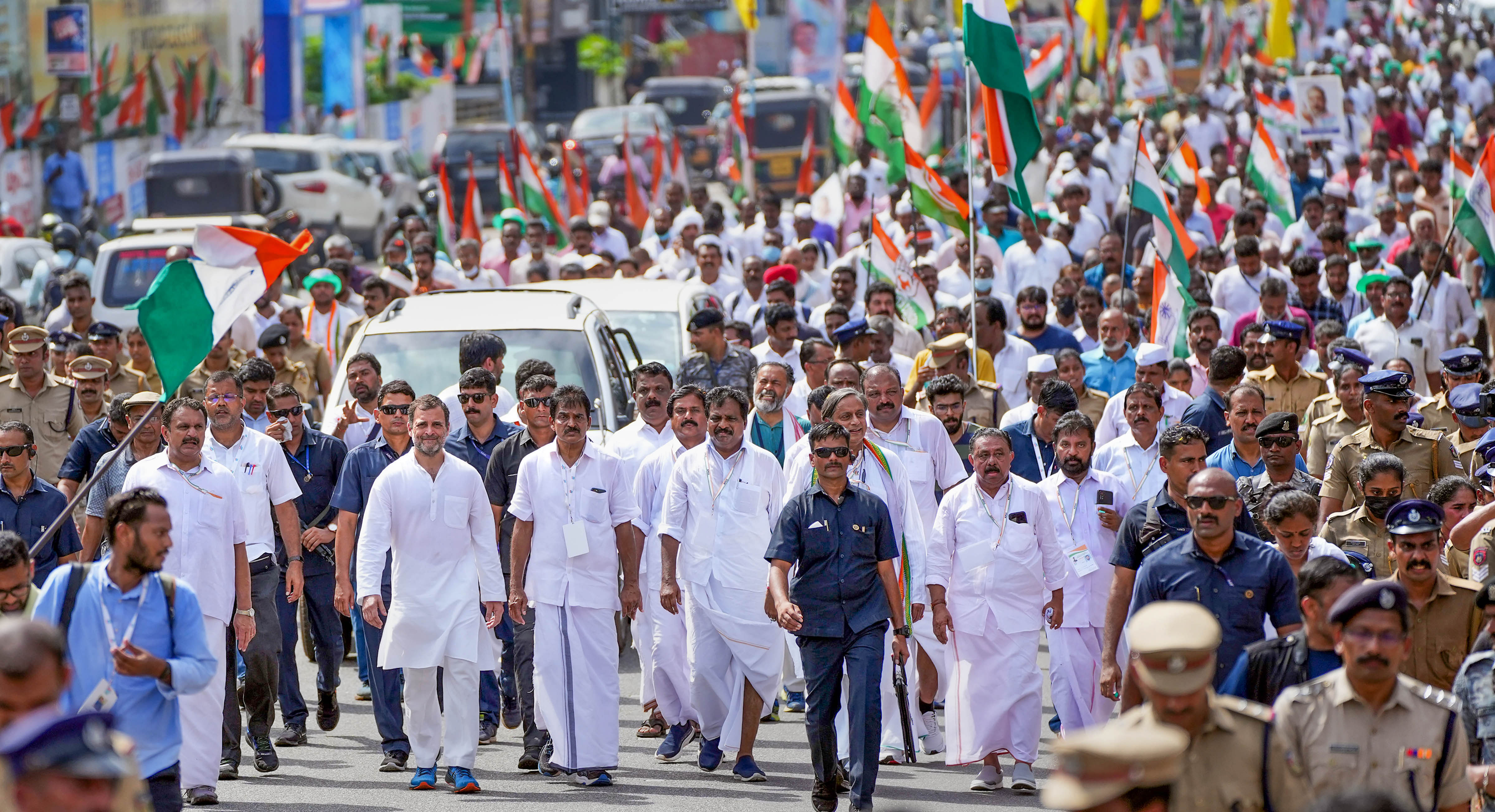 : Congress leaders Rahul Gandhi, KC Venugopal, Shashi Tharoor and other party workers during the Bharat Jodo Yatra. Credit: PTI Photo