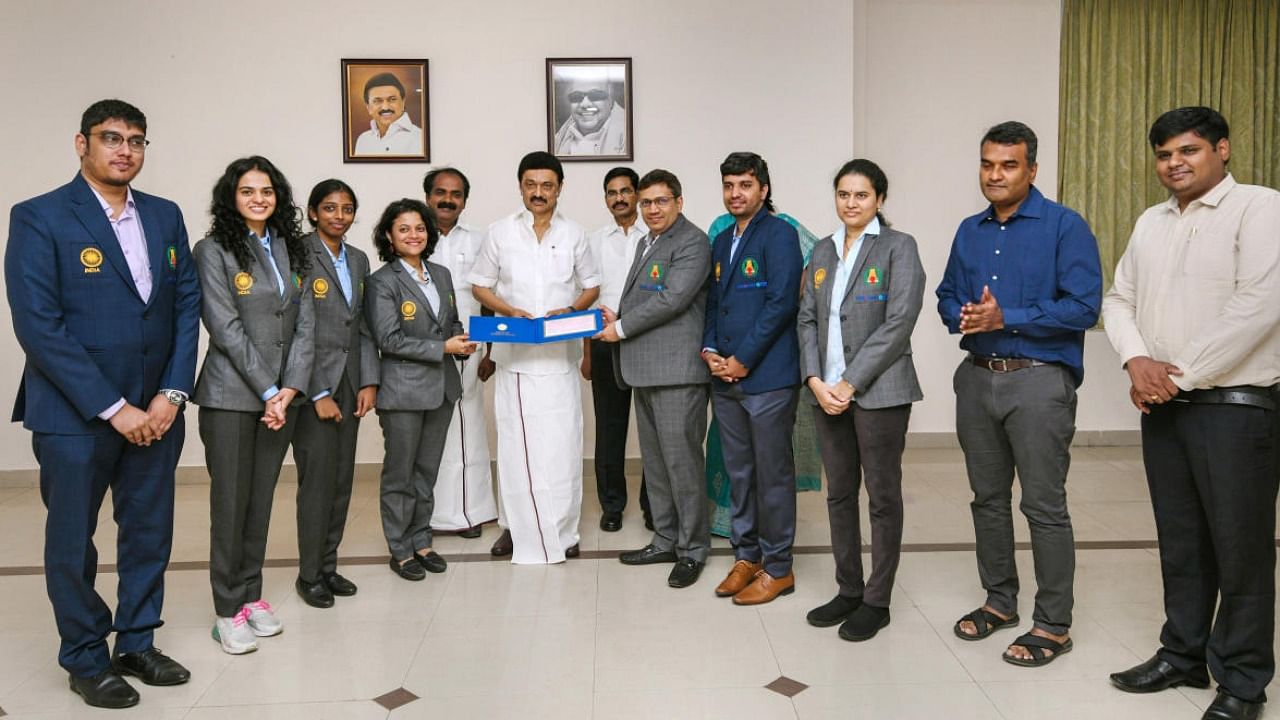 Tamil Nadu Chief Minister M K Stalin presents a cheque of Rs 1 crore each to India-B and India-A women's team for winning bronze medals in the 44th FIDE Chess Olympiad. Credit: PTI file photo