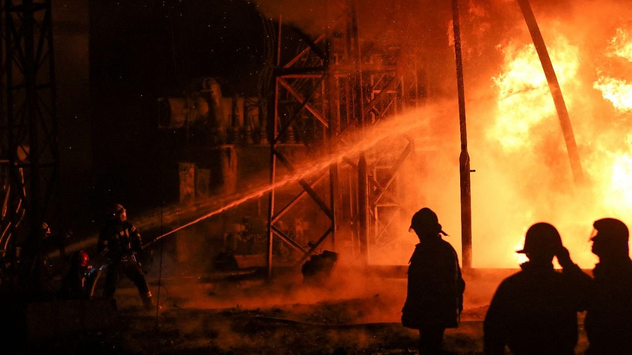 Firefighters work at a site of the 5th thermal power plant damaged by a Russian missile strike in Kharkiv, September 11, 2022. Credit: Reuters Photo