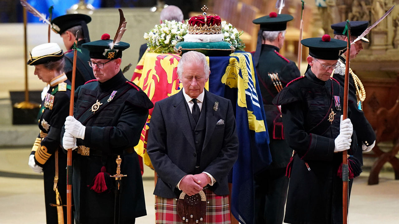 Britain's King Charles III, center, and other members of the royal family hold a vigil at the coffin of Queen Elizabeth II at St Giles' Cathedral, Edinburgh, Scotland, Monday Sept. 12, 2022. Credit: AP/PTI Photo