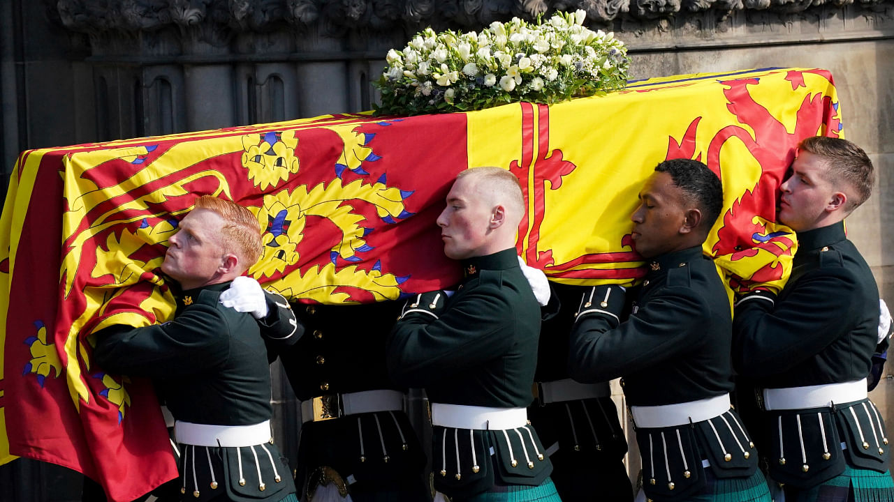 The coffin of Britain's Queen Elizabeth II is carried into St Giles' Cathedral, Edinburgh, Scotland, Monday Sept. 12, 2022. Credit: AP/PTI Photo
