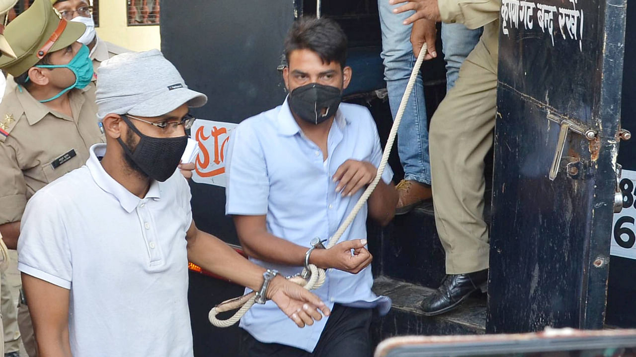 Police produce journalist Siddique Kappan (left) and three others to a court in Mathura, October 7, 2020. Credit: PTI File Photo