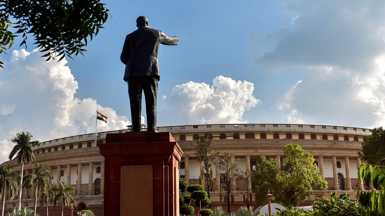 Clouds hover in the sky above Parliament House, in New Delhi. Credit: PTI File Photo