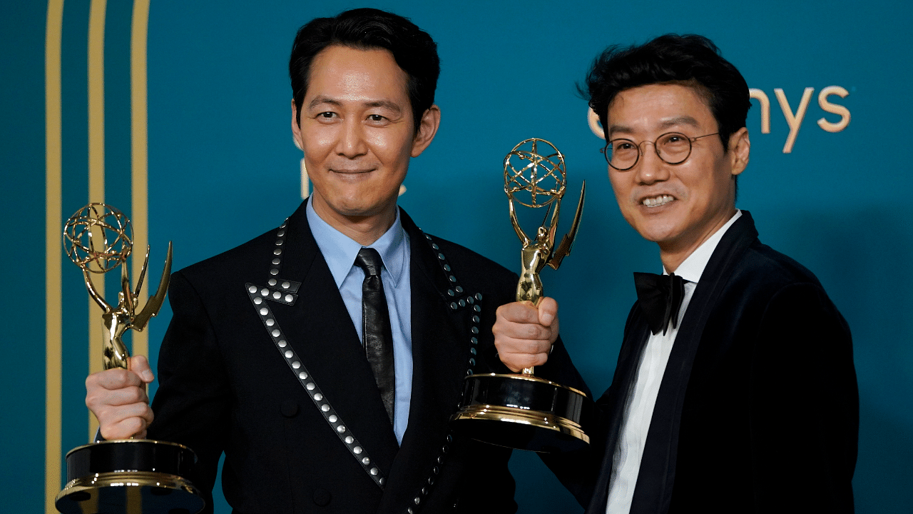 Lee Jung-jae, winner of the Emmy for outstanding lead actor in a drama series for "Squid Game," left, and Hwang Dong-hyuk, winner of the Emmy for outstanding directing for a drama series for "Squid Game". Credit: AP Photo
