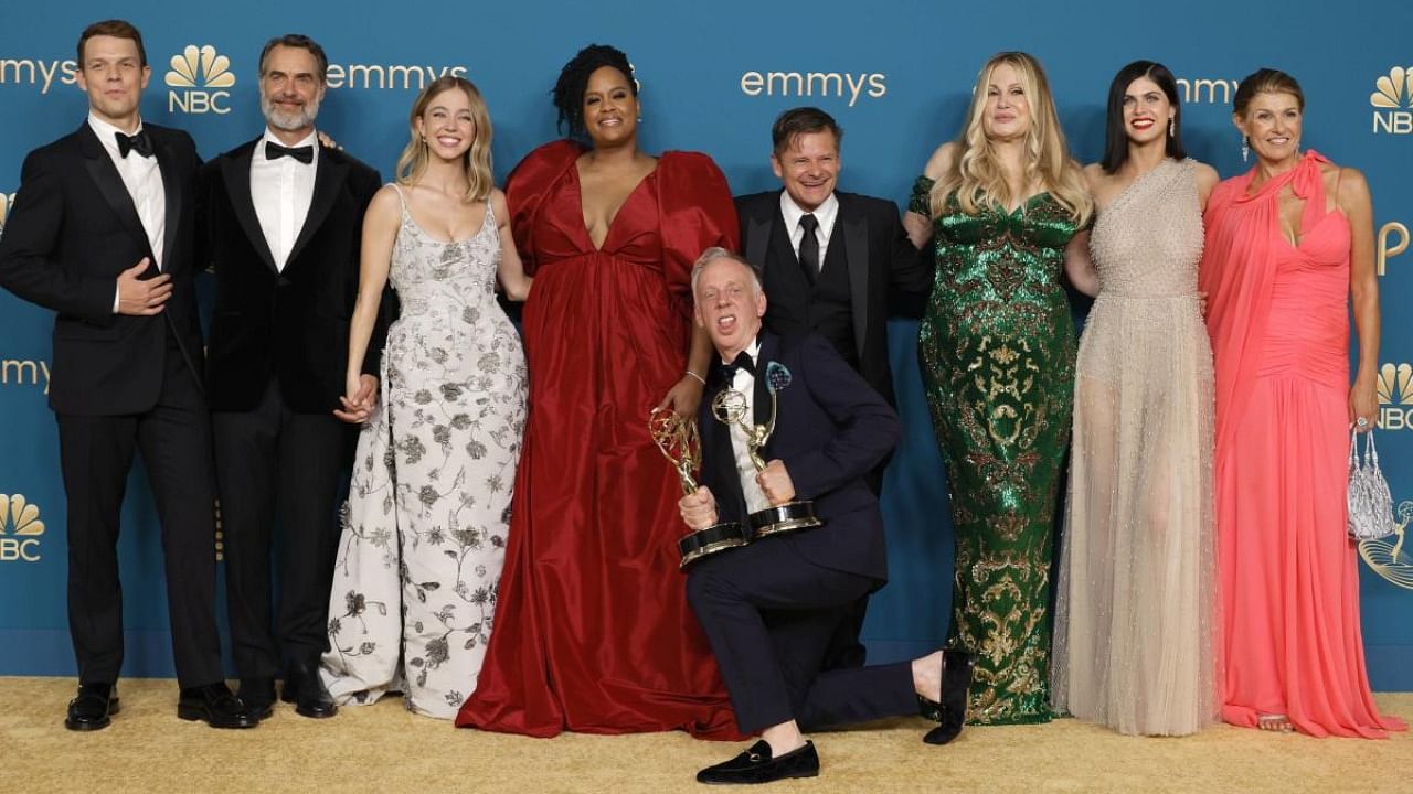 (L-R) Jake Lacy, Murray Bartlett, Sydney Sweeney, Natasha Rothwell, Mike White, Steve Zahn, Jennifer Coolidge, Alexandra Daddario, and Connie Britton winners of Outstanding Limited or Anthology Series or Movie for "The White Lotus", pose in the press room during the 74th Primetime Emmys at Microsoft Theater on September 12, 2022 in Los Angeles, California. Credit: AFP Photo