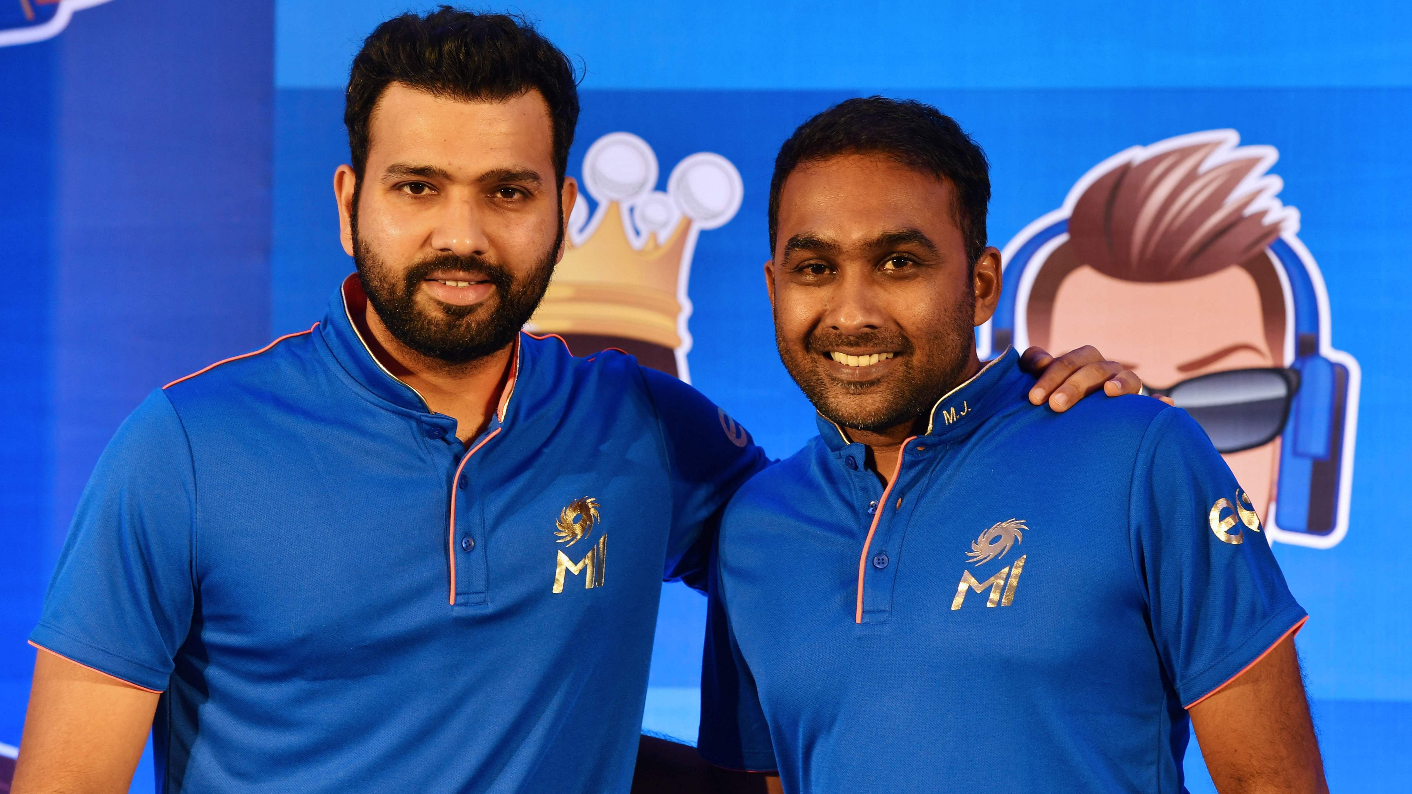 Mumbai Indians team captain Rohit Sharma (L) and coach Mahela Jayawardene pose for a picture. Credit: AFP Photo