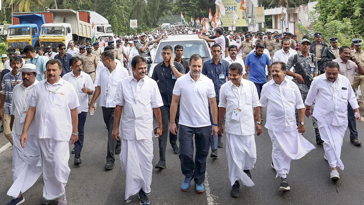 Congress leader Rahul Gandhi with party leaders and workers during the Bharat Jodo Yatra, in Thiruvananthapuram. Credit: PTI Photo