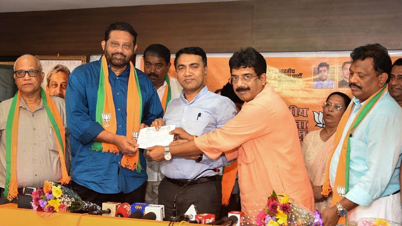 Goa Chief Minister Pramod Sawant and Goa BJP President Sadanand Shet Tanavade welcome eight Congress MLAs who joined the party, in Panaji. Credit: PTI Photo