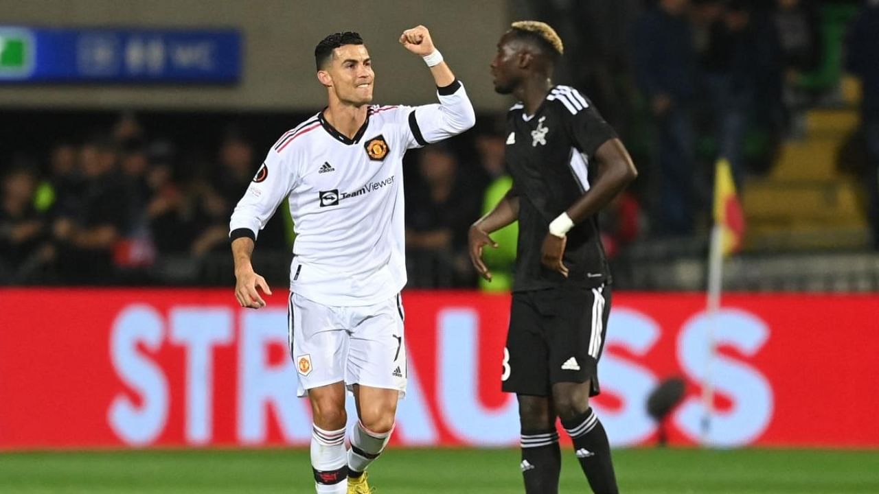 Manchester United's Portuguese striker Cristiano Ronaldo celebrates scoring the 0-2 from the penalty spot during the UEFA Europa League group E football match between Sheriff and Manchester United at Zimbru stadium in Chisinau. Credit: AFP Photo