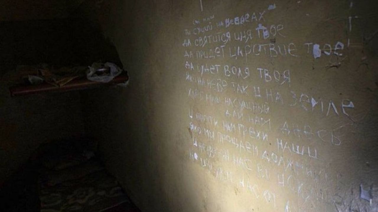 The Lord's Prayer carved on the wall by Ukrainian prisoners in a 'torture room' found. Credit: Twitter/@DefenceU