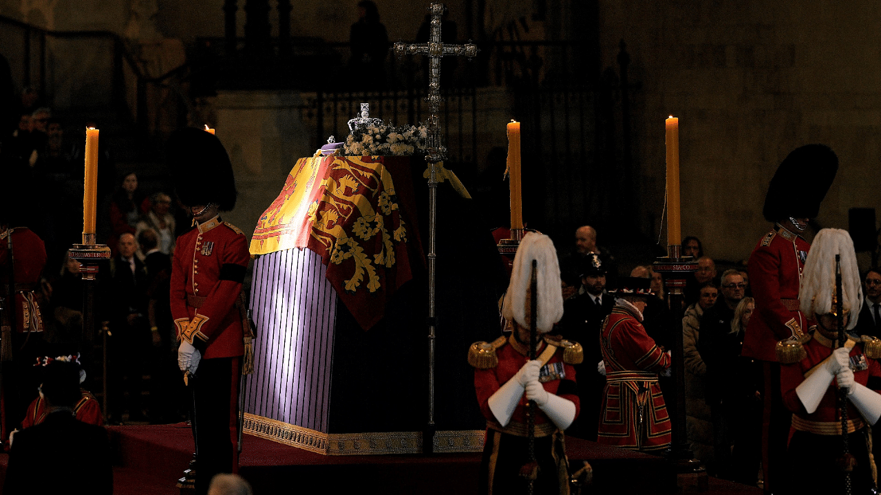 Members of the public pay their respects as they pass the coffin of Queen Elizabeth II, Lying in State inside Westminster Hall, at the Palace of Westminster in London on September 18, 2022. Credit: AFP Photo