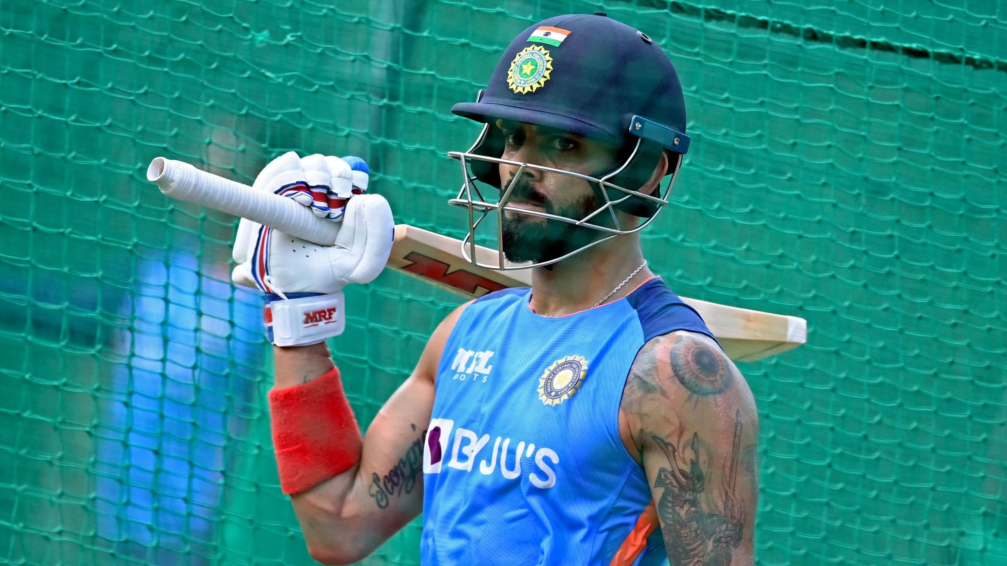Kohli is ready to get out of his comfort zone to follow the team's new template and a rare sweep shot during the Asia Cup is a testimony to that. Credit: AFP Photo