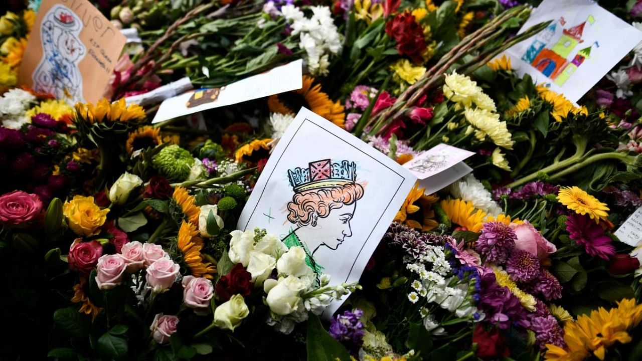 Queen Elizabeth II will be buried Monday alongside her father, King George VI, and other family members at Windsor Castle outside London, after a state funeral attended by world leaders in the heart of the British capital. Credit: AFP Photo