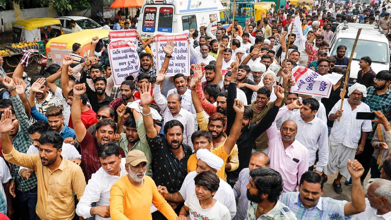 Members of Maldhari community whose traditional occupation is cattle-rearing, take part in a protest rally against the Gujarat Cattle Control (Keeping and Moving) in Urban Areas Bill. Credit: PTI Photo