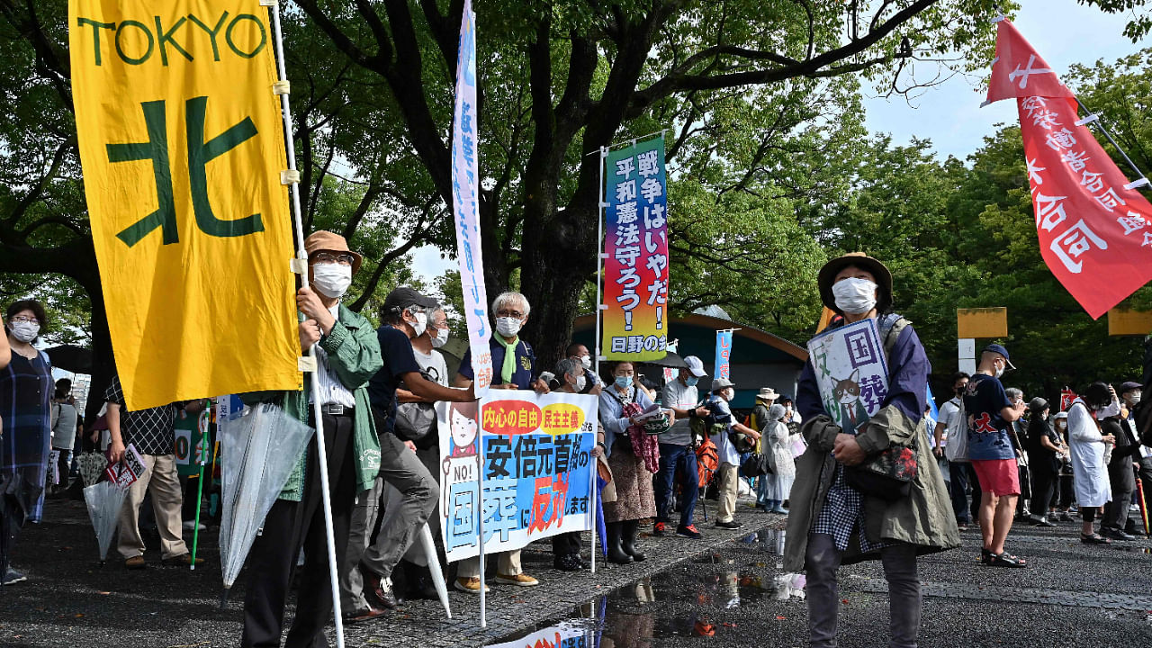 Anti-war, anti-nuclear and people against the government's funding for the funeral of late Japanese prime minister Shinzo Abe take part in a protest rally and march in Tokyo on September 19, 2022. Credit: AFP Photo