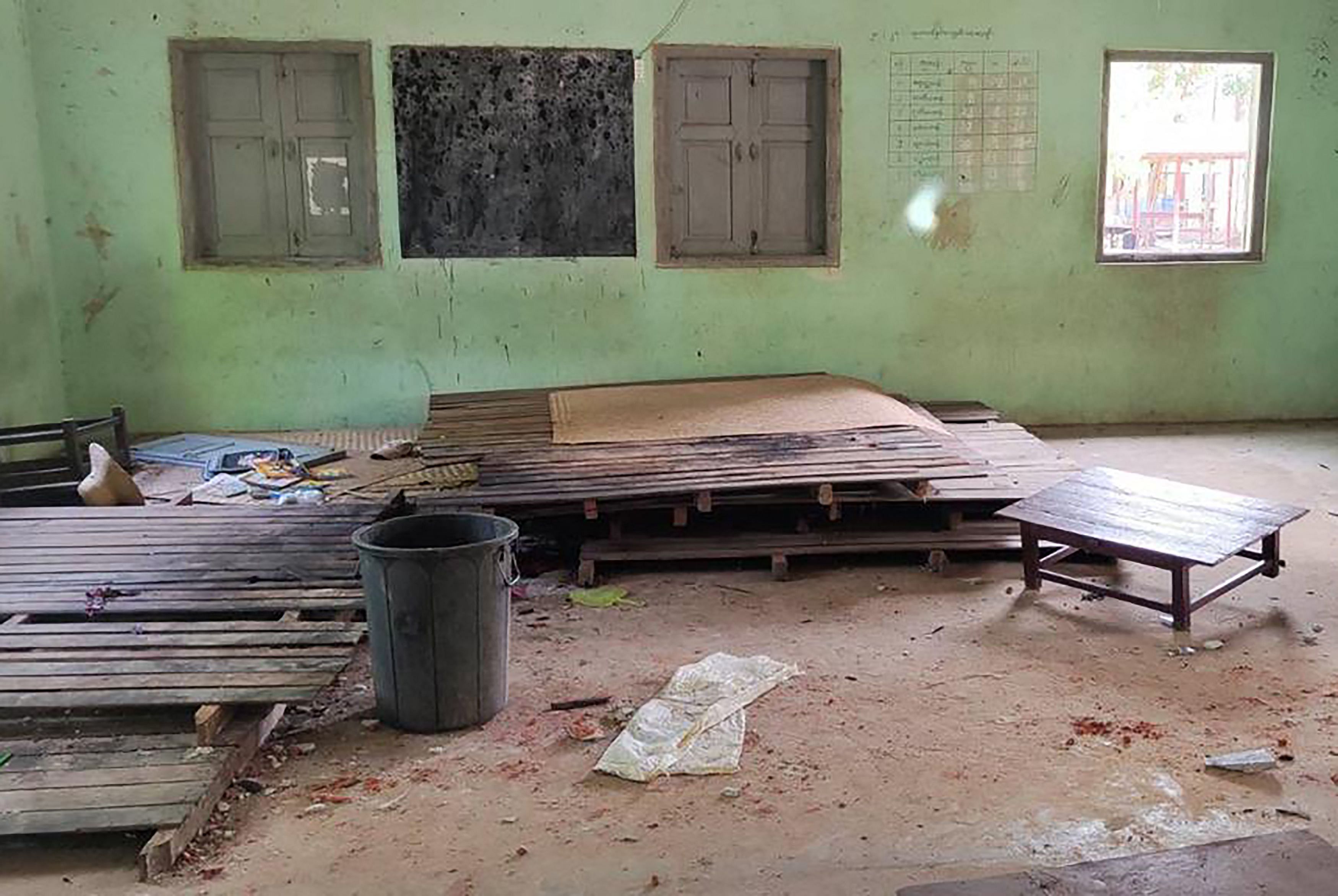 Debris and bloodstains on the floor of a damaged school building in Depeyin township in Myanmar's northwest Sagaing region, a day after an attack on the village by a Myanmar military helicopter. Credit: AFP Photo