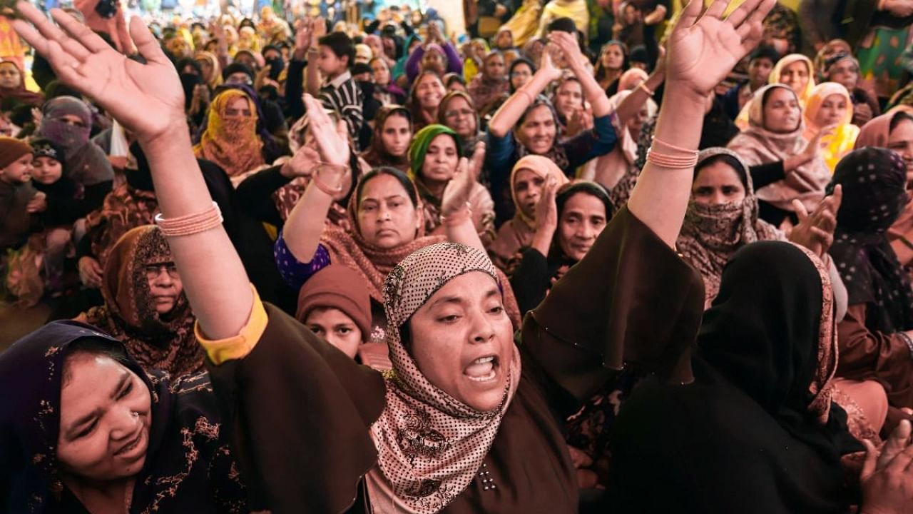 Protesters raise slogans during a demonstration against the amended Citizenship Act and National Register of Citizens at Shaheen Bagh. Credit: PTI File Photo