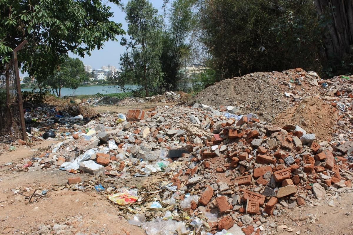 The construction and demolition (C&amp;D) debris dumped around Arekere lake. Pic credit: Saahas