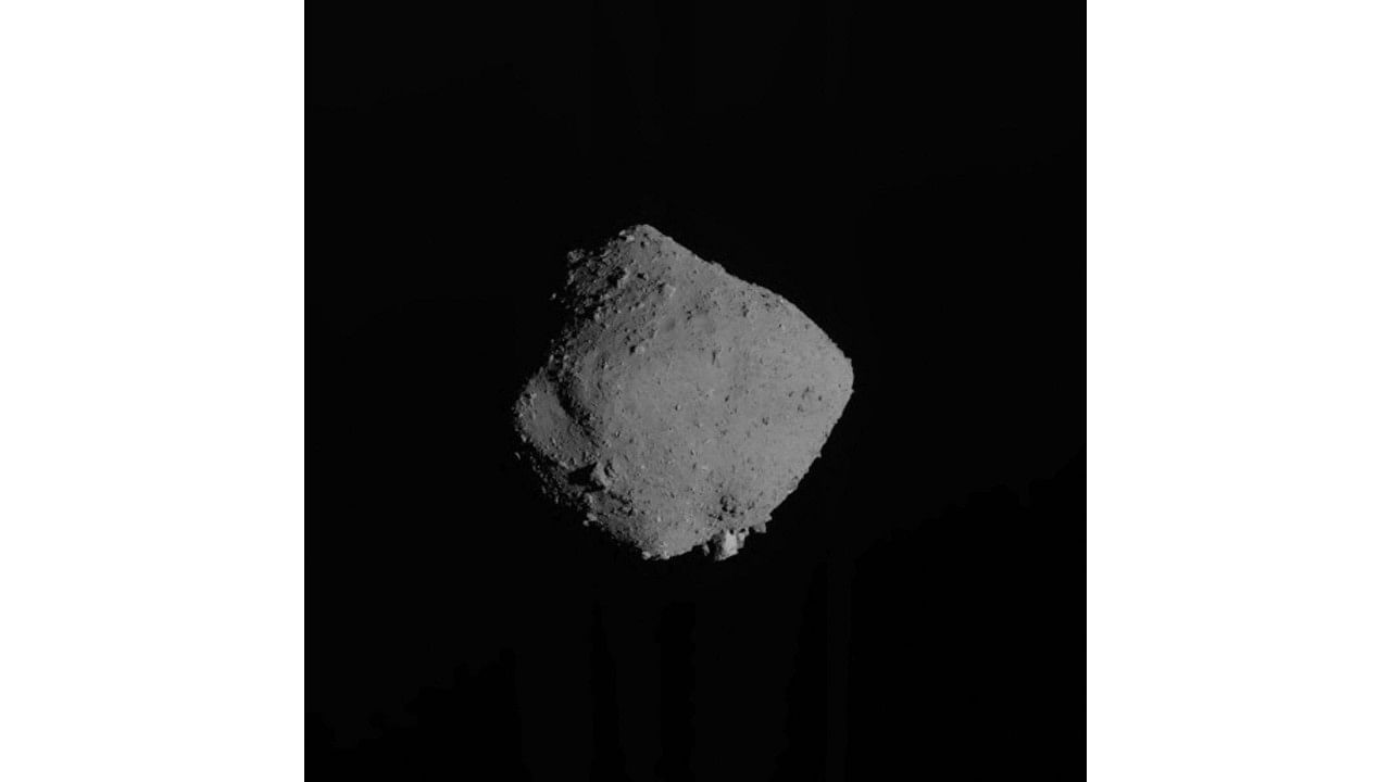 Specks of dust retrieved by a space probe from the asteroid Ryugu some 300 million kilometres from Earth have revealed a surprising component: a drop of water, scientists said. Credit: AFP Photo