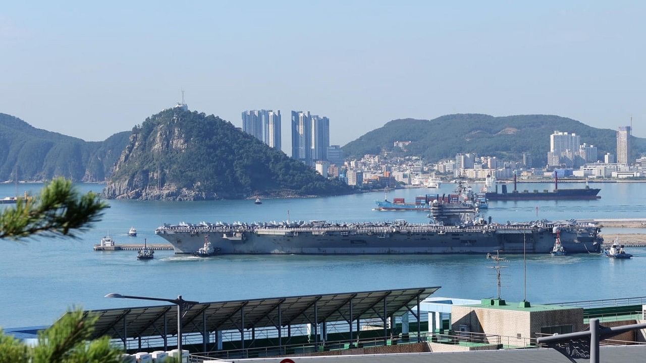 US Navy aircraft carrier USS Ronald Reagan is anchored at a port in Busan. Credit: Reuters Photo