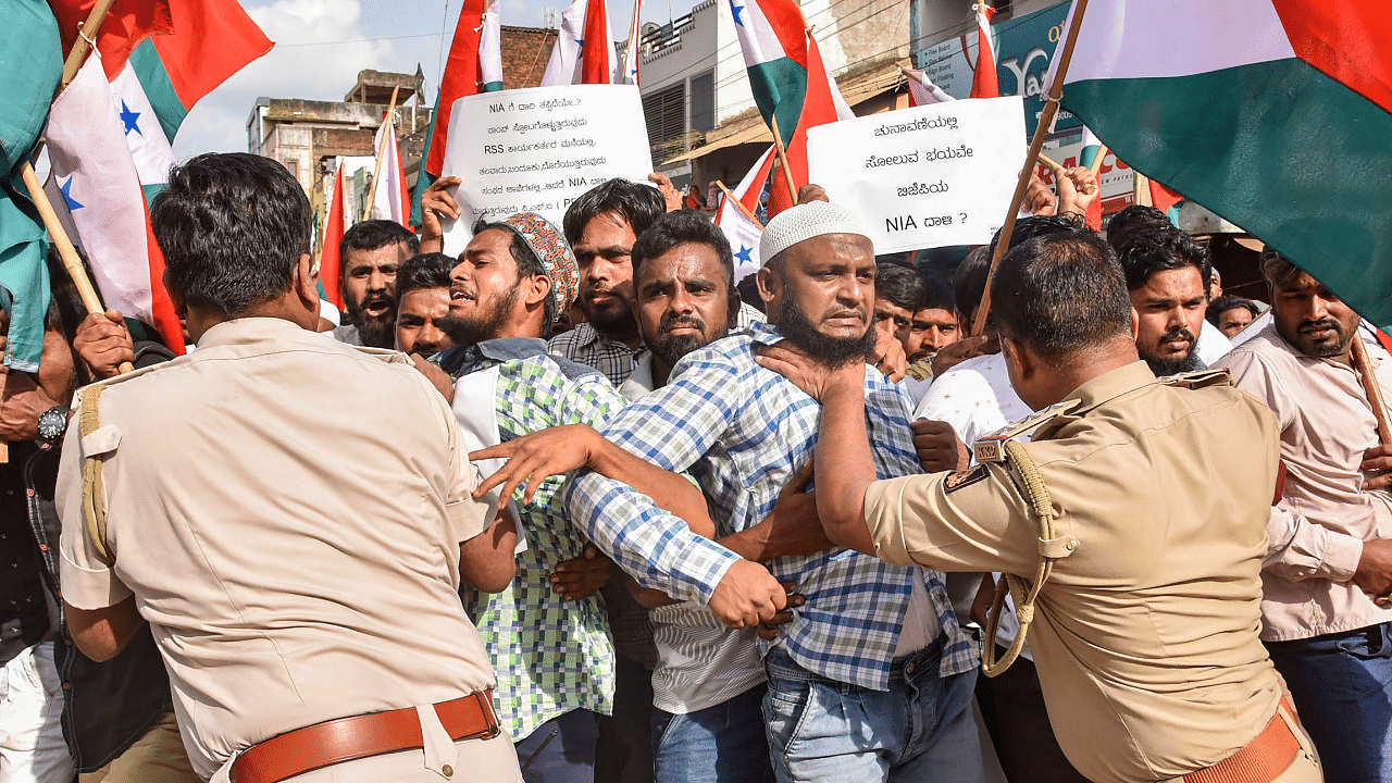 PFI, SDPI workers protest in Hubballi. Credit: PTI Photo