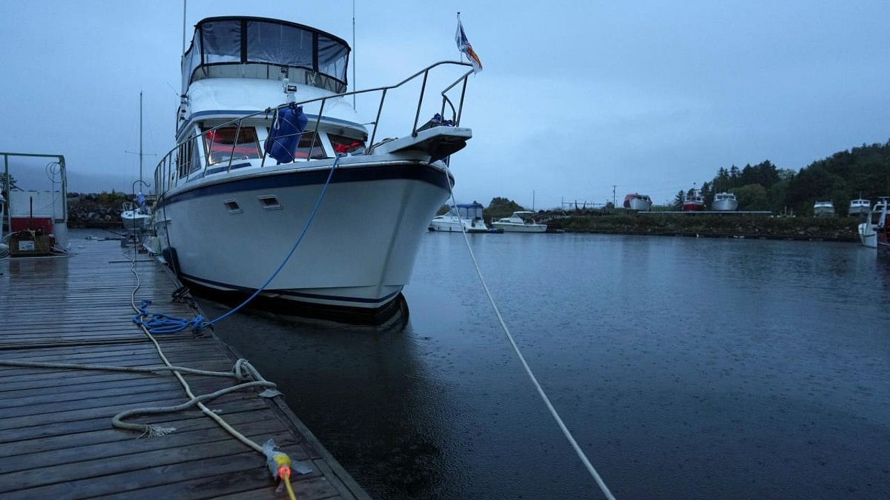 A boat is tied up before the arrival of Hurricane Fiona, in Corner Brook, Newfoundland, Canada. Credit: Reuters Photo