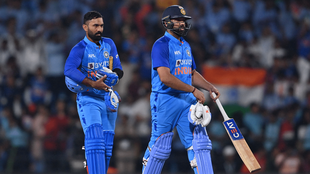 India's captain Rohit Sharma (R) and India's wicketkeeper Dinesh Karthik. Credit: AFP Photo