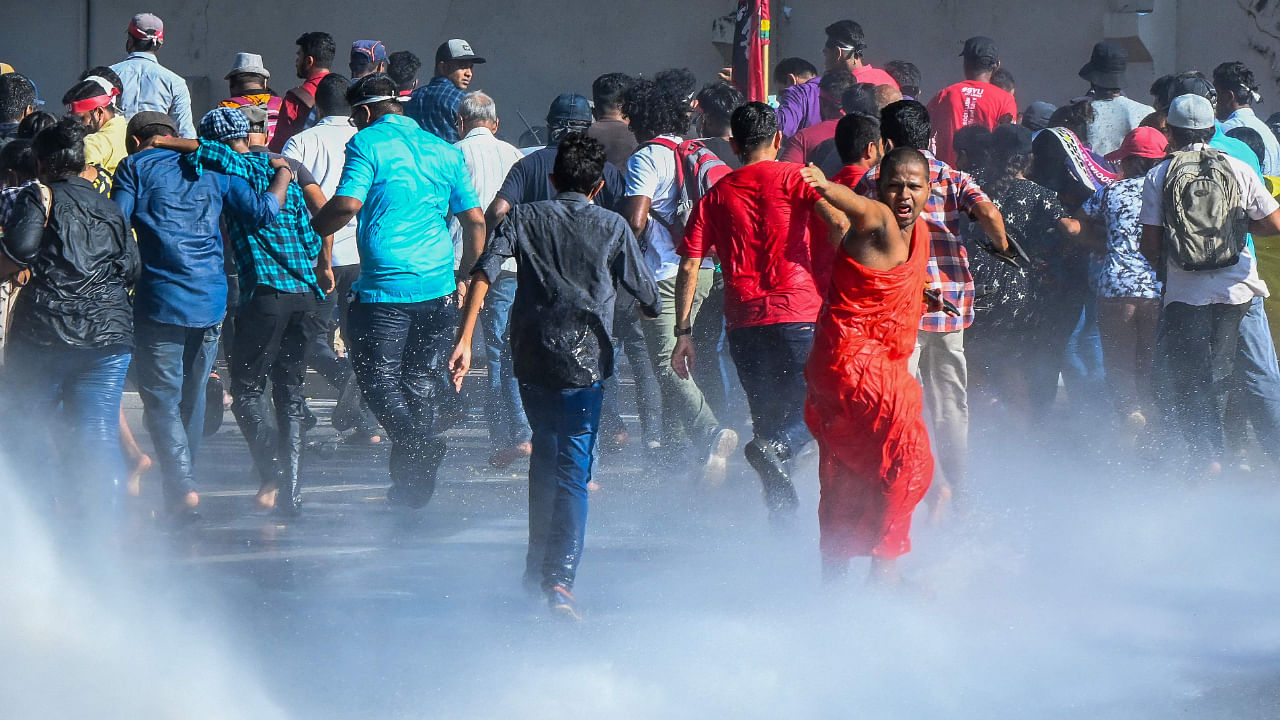 Police use water cannons to disperse anti-government protestors during a demonstration in Colombo on September 24, 2022. Credit: AFP Photo