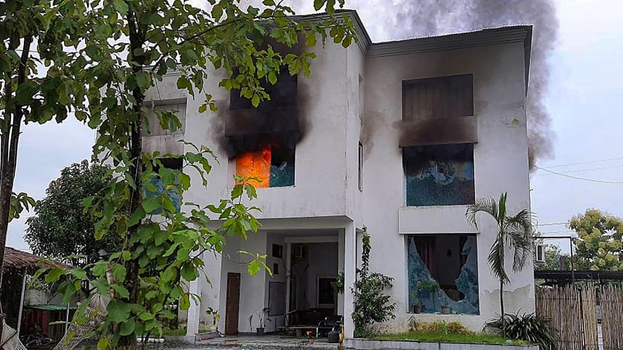  Smoke billows from a factory owned by Pulkit Arya after locals set it on fire, in Pauri Garhwal district, Saturday, Sept. 24, 2022. Credit: PTI Photo