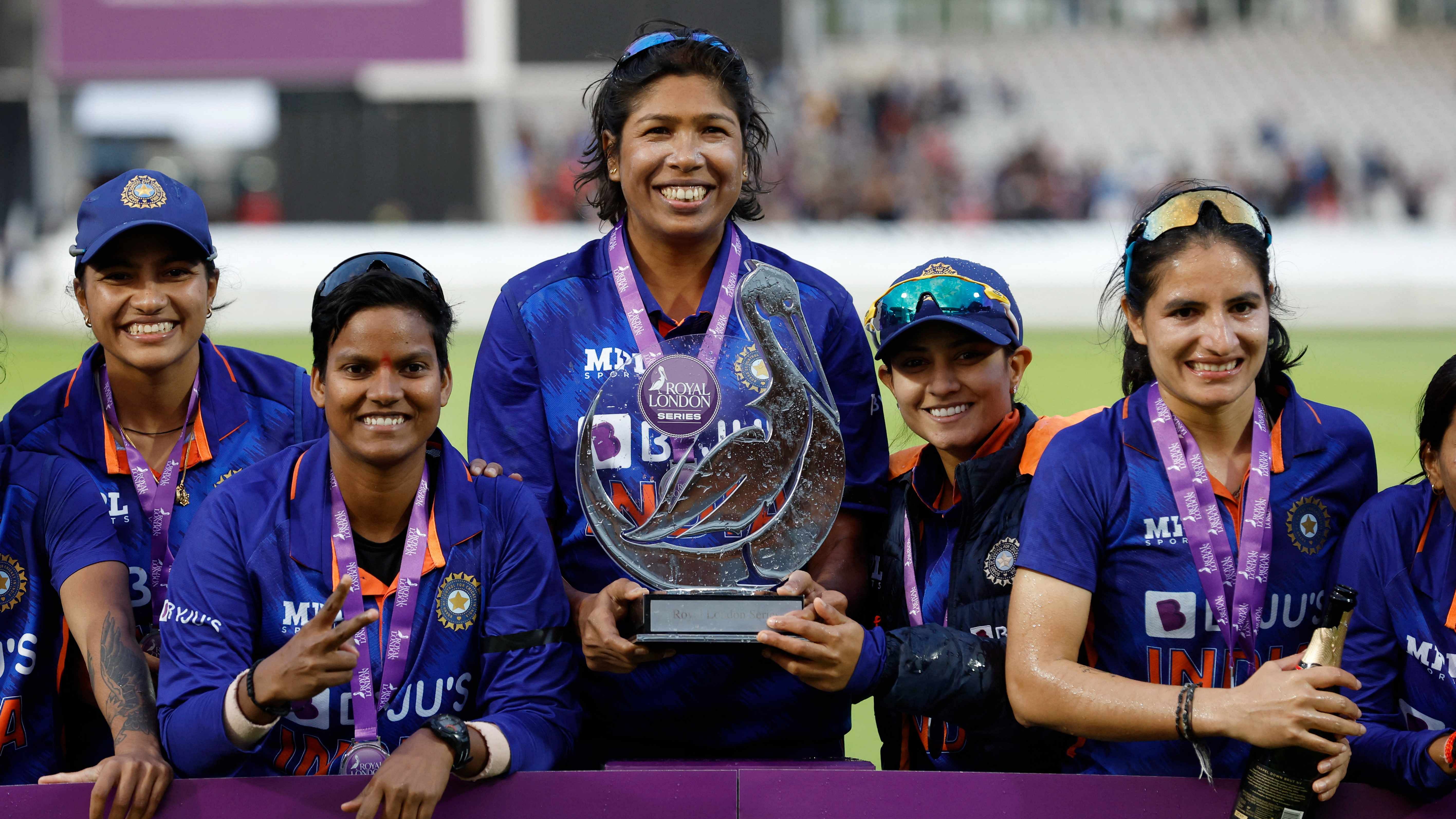 India's Jhulan Goswami celebrates with the trophy. Credit: Reuters Photo