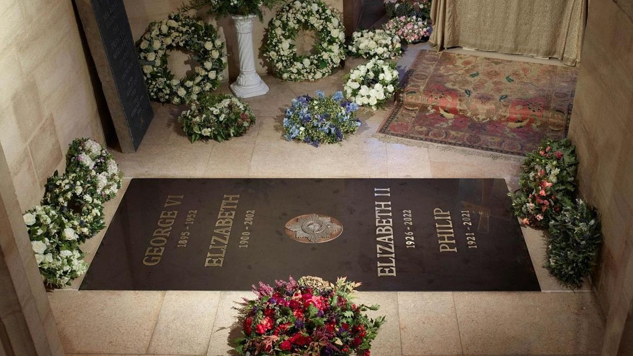 An inscribed stone slab marking the death of Queen Elizabeth II has been laid in the Windsor Castle chapel where her coffin was interred. Credit: AFP Photo