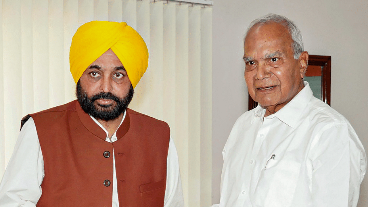 File photo of Punjab Governor Banwarilal Purohit with CM Bhagwant Mann. Credit: PTI File Photo