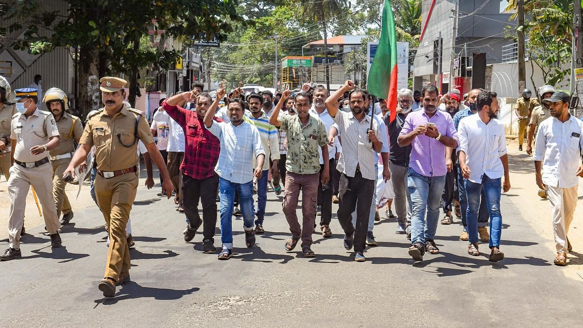 Activists of Popular Front of India (PFI) march during the 'hartal' called by PFI in protest against the nationwide arrest of its leaders by NIA and ED. Credit: PTI file photo