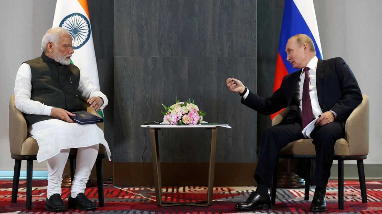 Russian President Putin and Indian Prime Minister Modi meet in Samarkand. Credit: Reuters File Photo