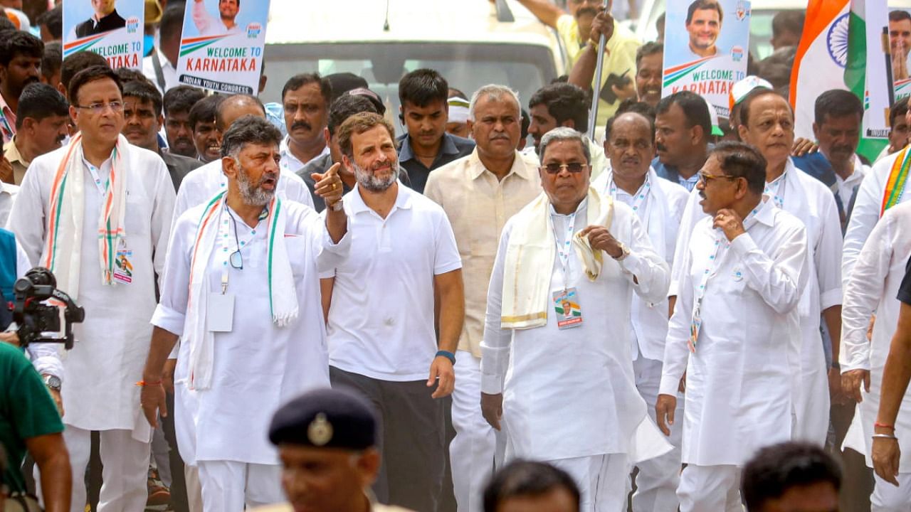 Congress leader Rahul Gandhi with AICC General Secretary & Karnataka in-charge Randeep Singh Surjewala, KPCC President D K Shivakumar, Opposition leader in Assembly Siddaramaiah and other leaders during the party's Bharat Jodo Yatra, at Gundlupet. Credit: PTI Photo
