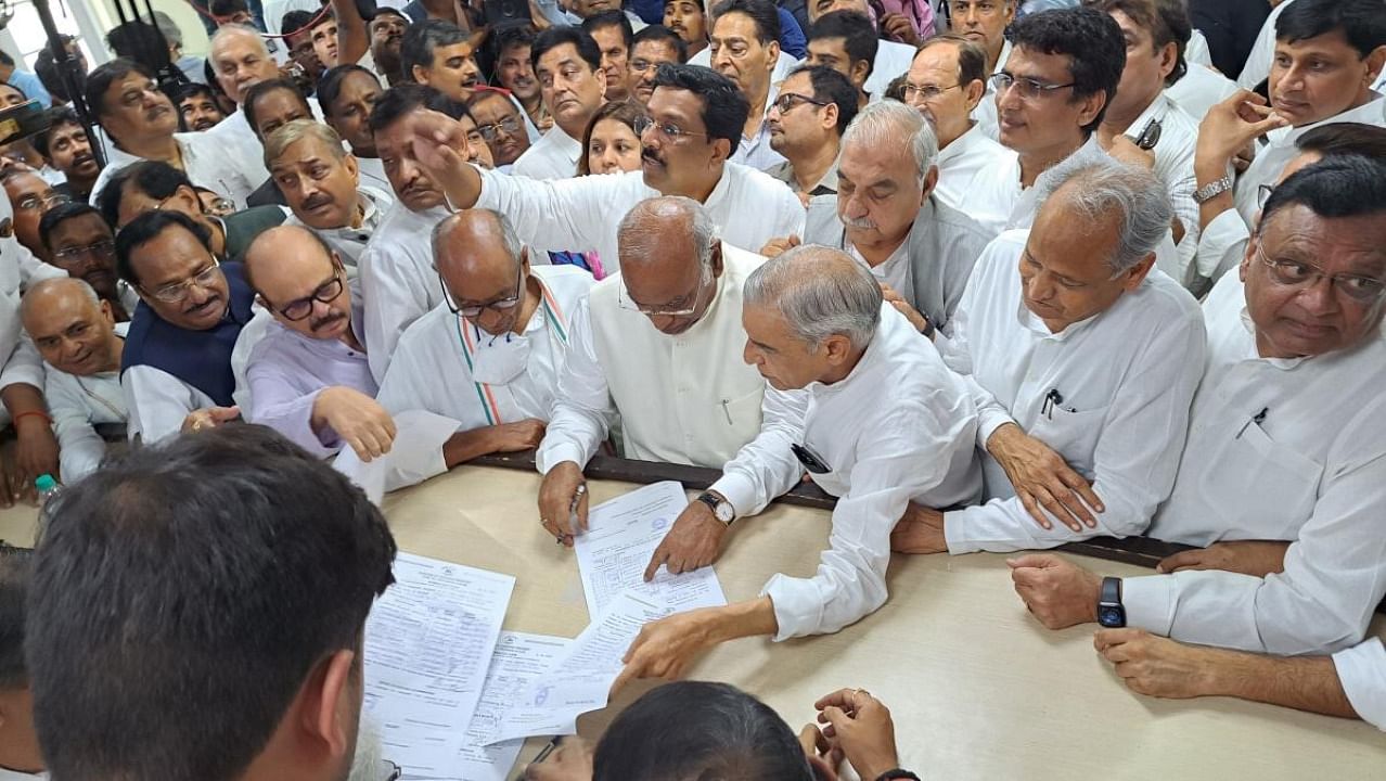 Senior Congress leader Mallikarjun Kharge files his nomination papers for the post of party President, at AICC headquarters in New Delhi. Credit: PTI Photo