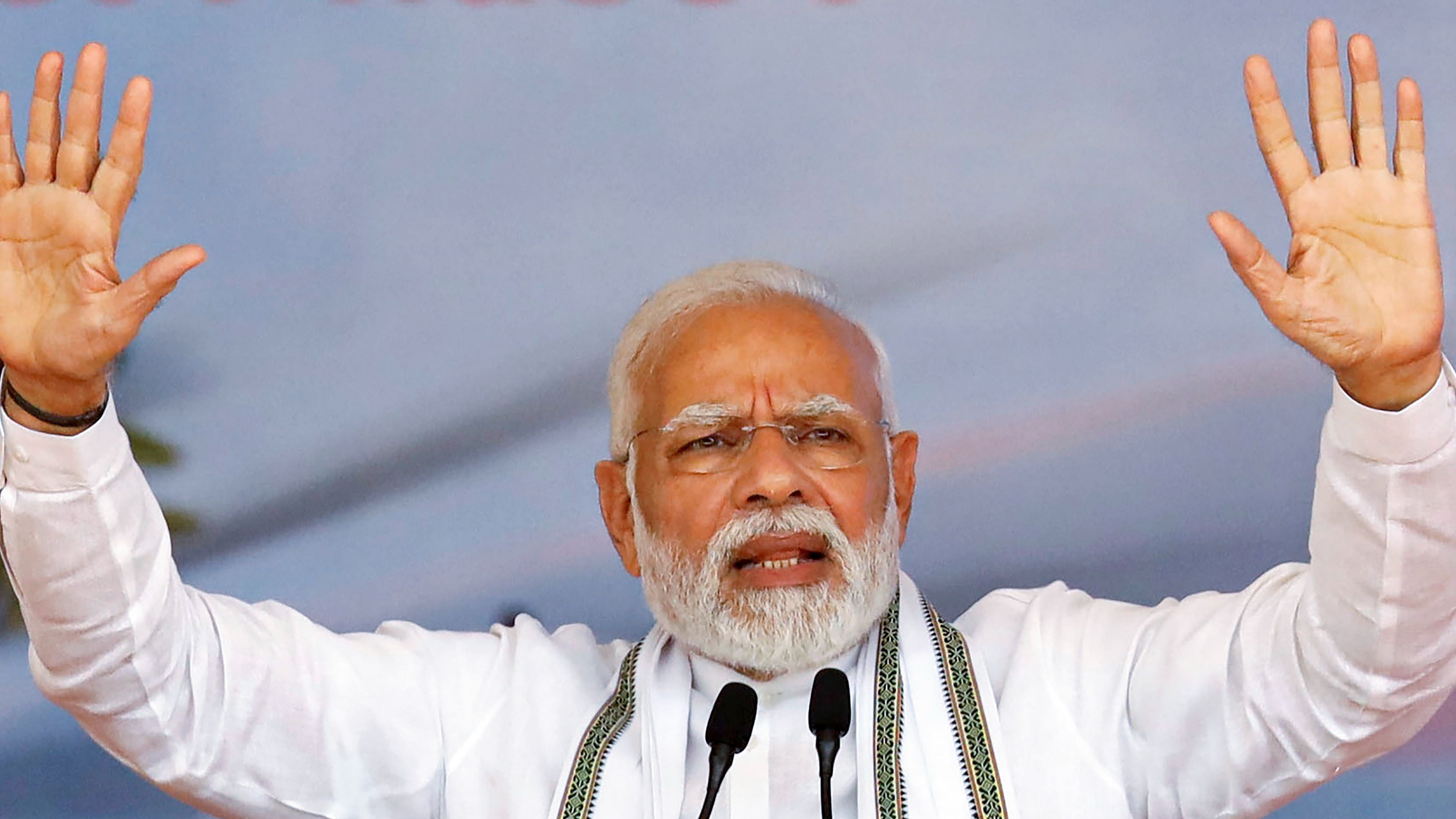 On the second day of his Gujarat visit, Modi flagged off the Gandhinagar-Mumbai Vande Bharat Express train. Credit: PTI Photo