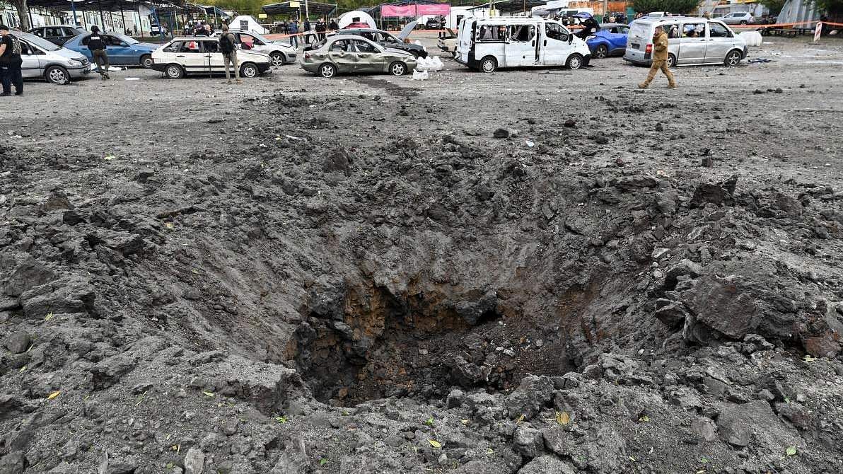 A crater left by a Russian missile strike, that hit a convoy of civilian vehicles amid Russia's attack on Ukraine, is seen in Zaporizhzhia, Ukraine September 30. Credit: Reuters Photo