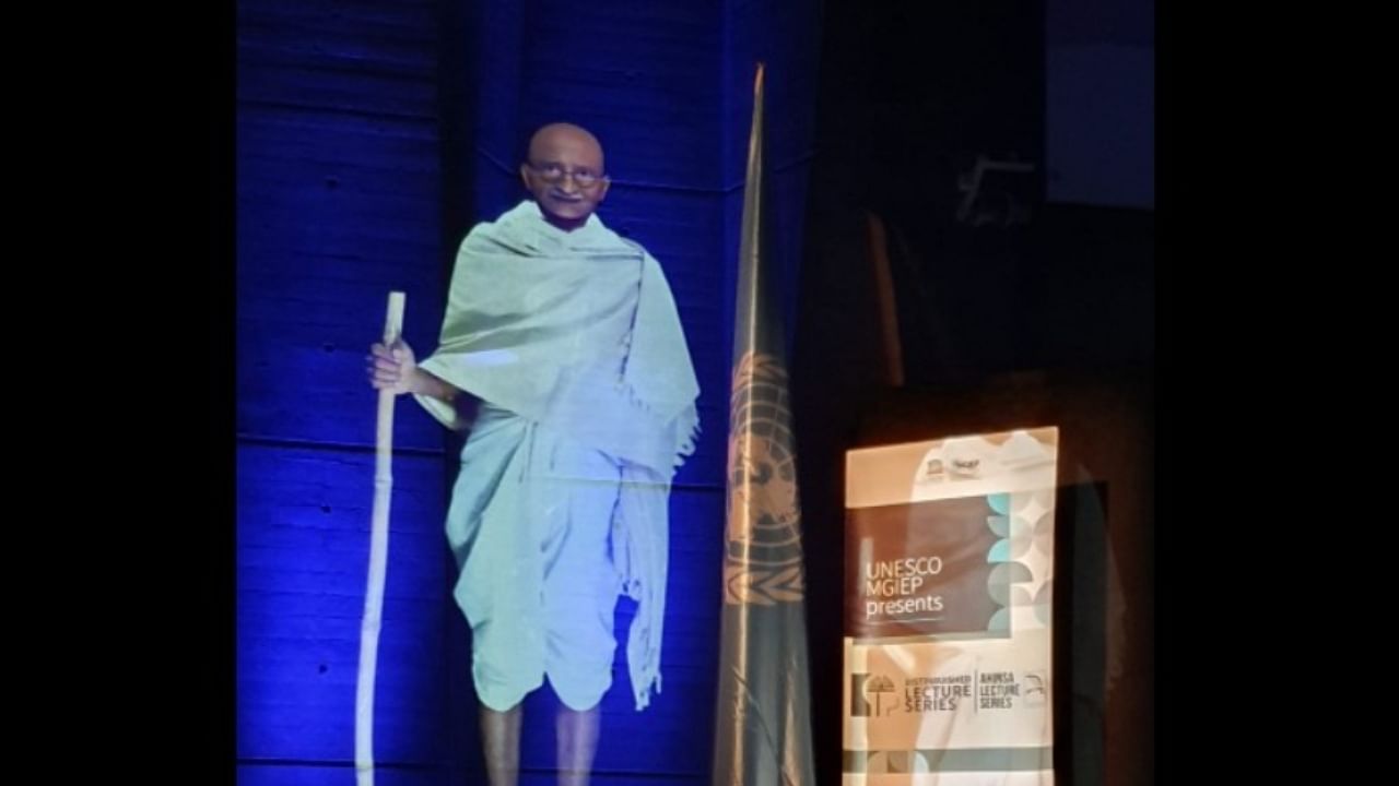 A special life-size hologram of Gandhi was projected during a panel discussion. Credit: mgiep.unesco.org