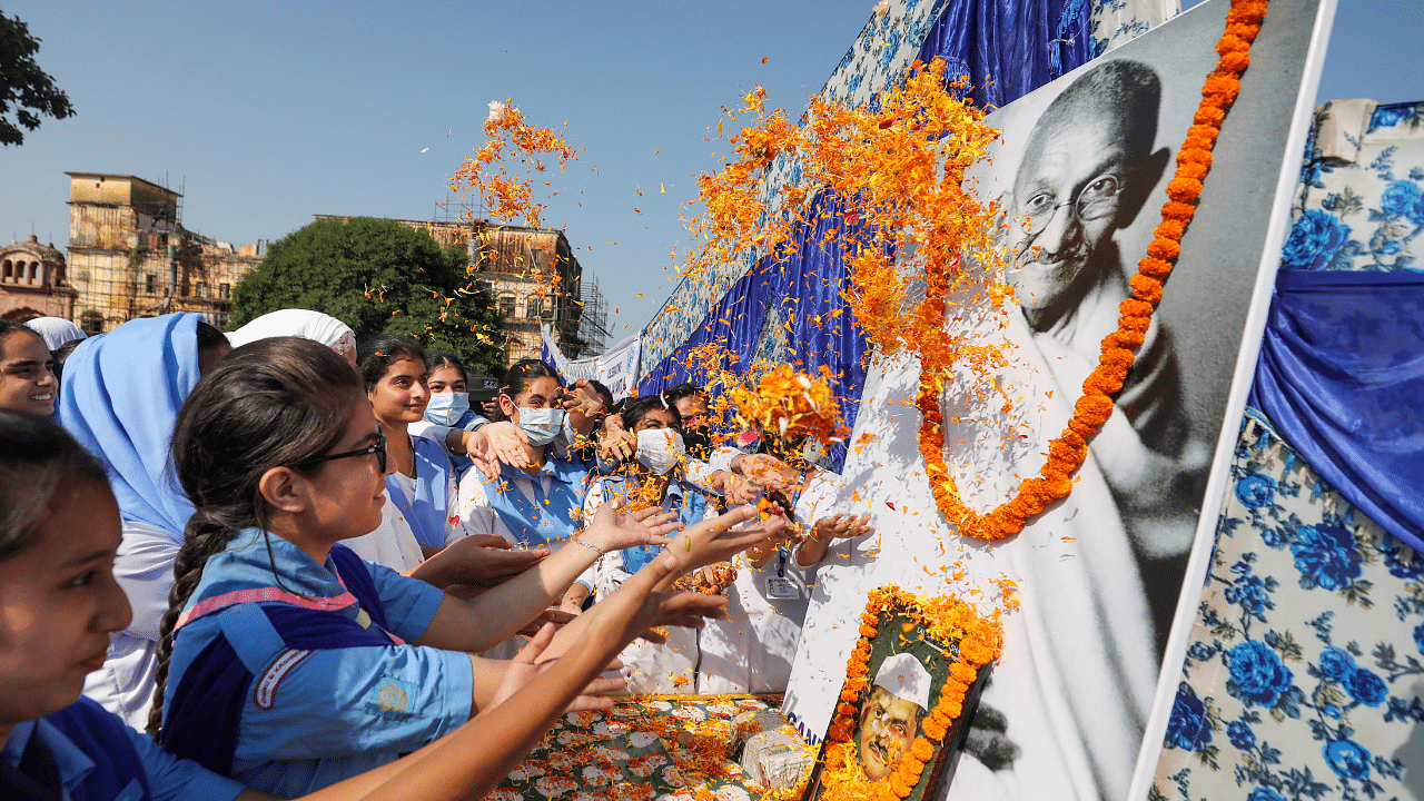 Students pay tribute to Mahatma Gandhi on his birth anniversary. Credit: PTI Photo