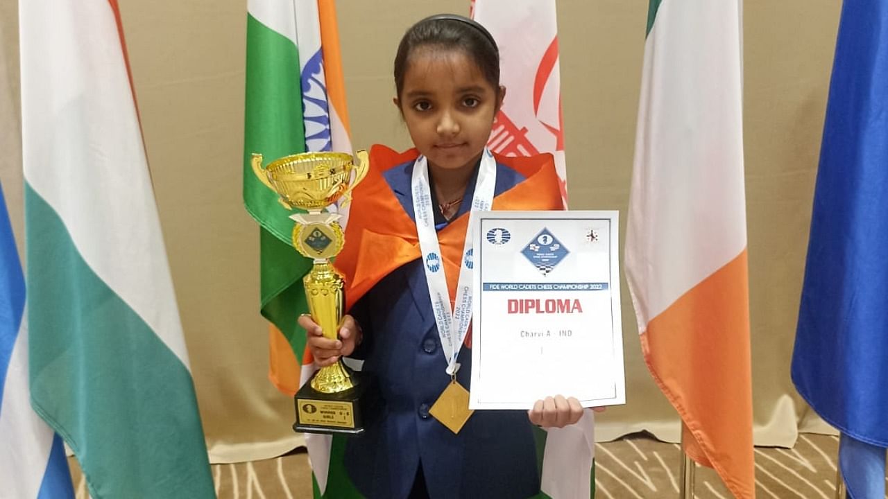 Charvi Anilkumar on with her gold medal and trophy after winning the U-8 title at the FIDE World Cadets Championship in Batumi, Georgia. Credit: Special arrangement